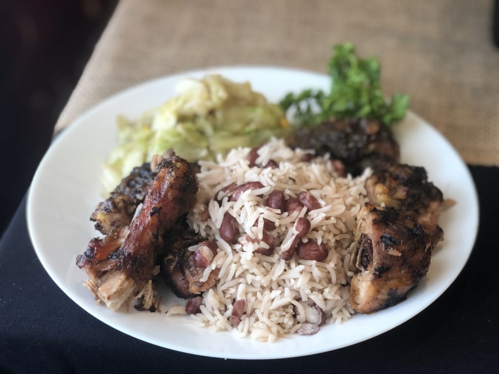 Upohar jerk chicken with Jamaican rice and beans and braised cabbage