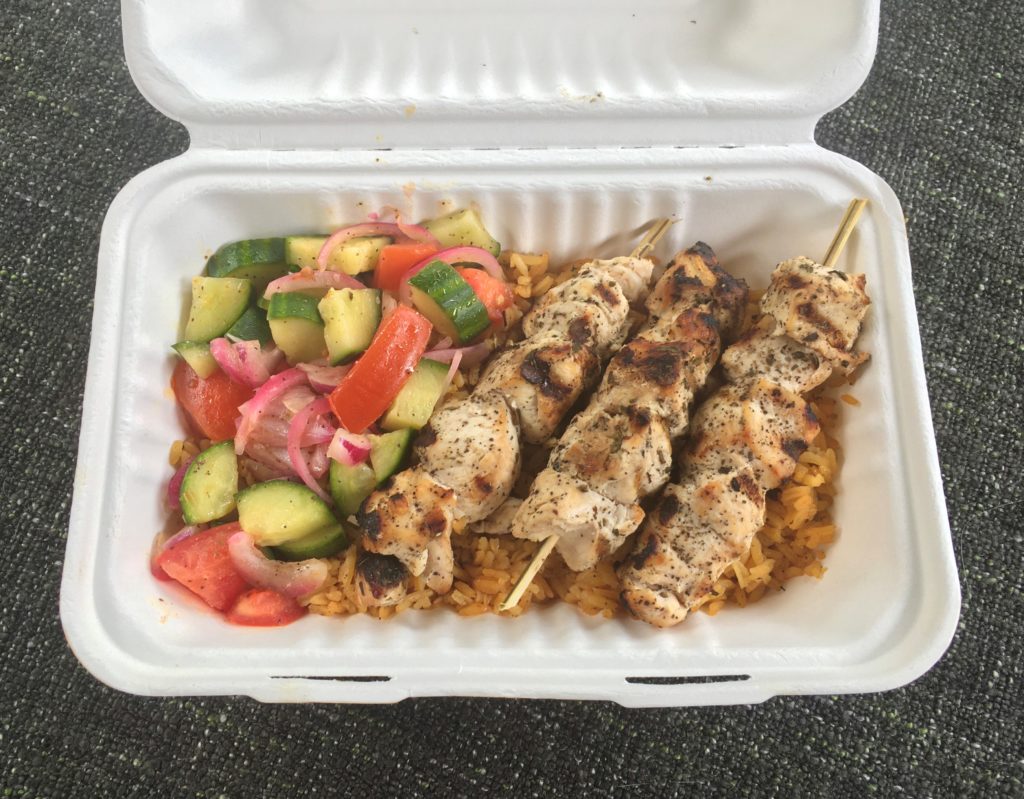 Chicken souvlaki with rice pilaf and salad