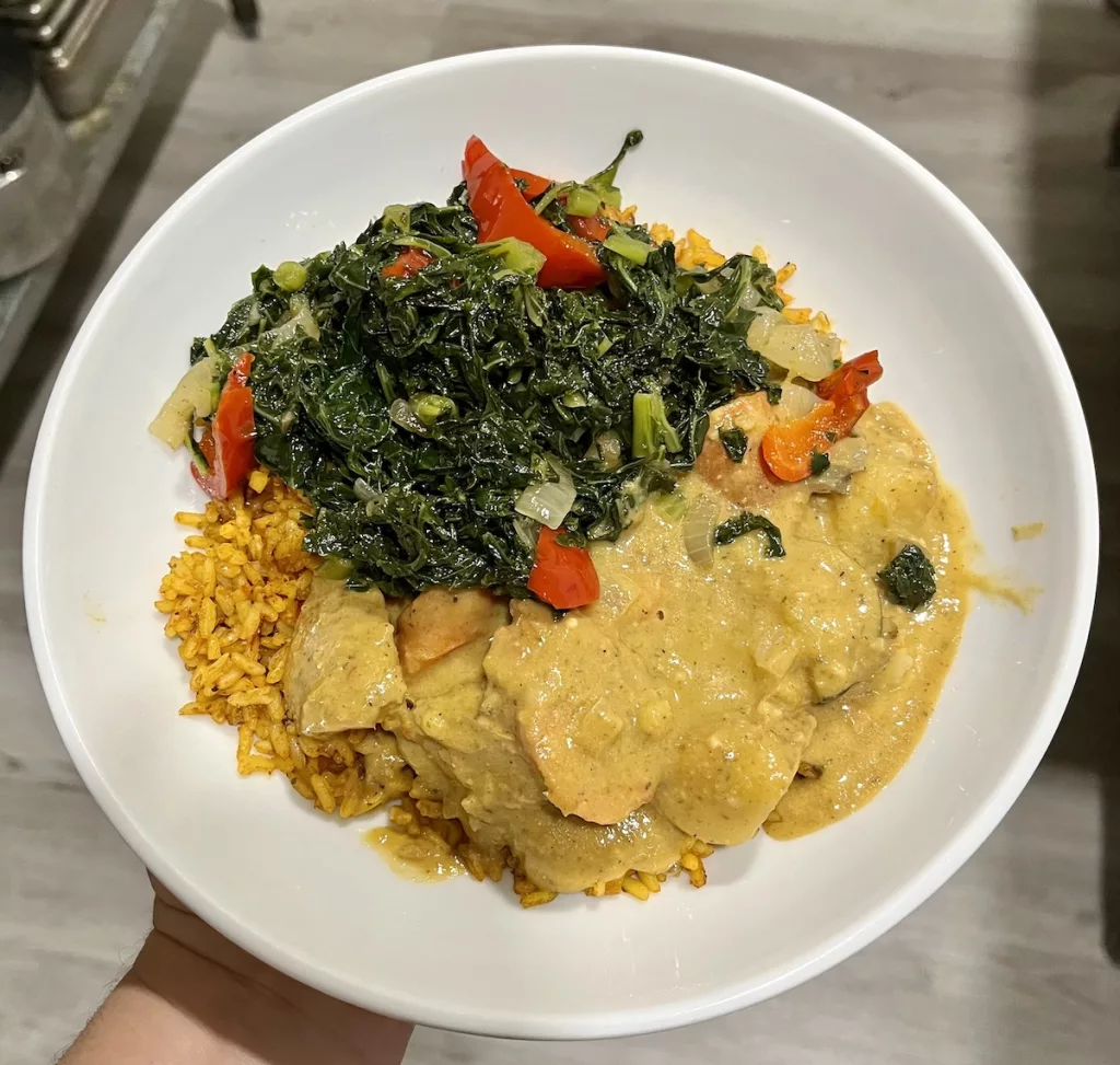 West African Peanut Stew on Jollof Rice with Sauteed Kale
