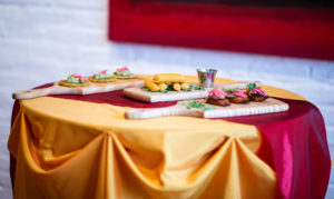 Caribbean appetizers on gold tablecloth